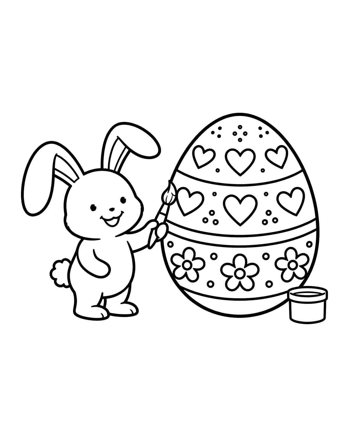Ausmalbild Osterhase beim Eier bemalen zum Ausdrucken